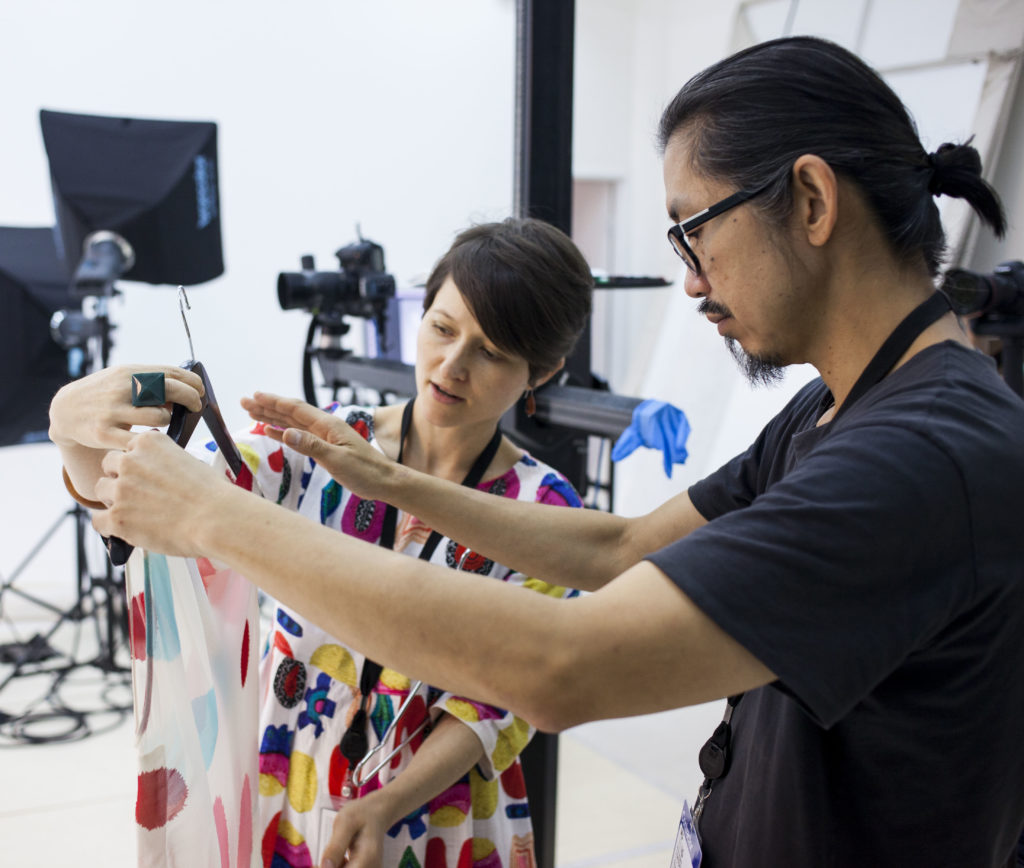 Akira Isogawa with MAAS Curator Kristina Stankovski, preparing an asymmetrical spot-print top